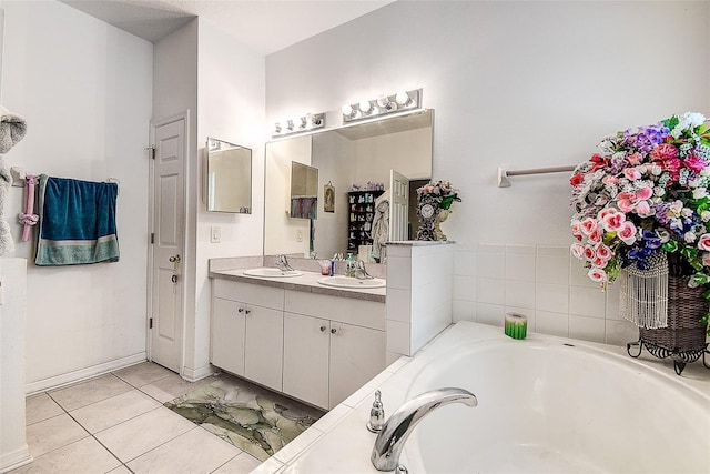 14985 Alan Ct, Largo, FL 33771 - full bathroom with a bath, double vanity, and tile patterned flooring