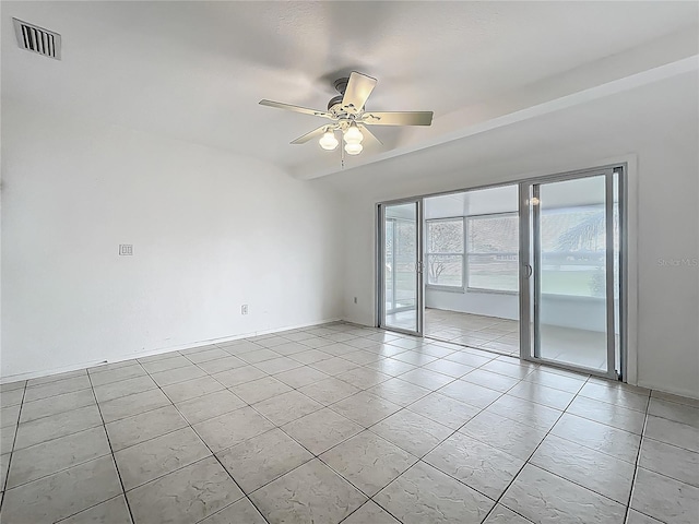904 Desert Hills Dr, Sun City Center, FL 33573 - empty room with ceiling fan and light tile patterned floors