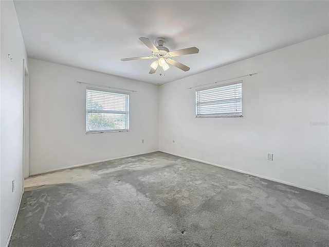 904 Desert Hills Dr, Sun City Center, FL 33573 - unfurnished room featuring healthy amount of natural light, carpet floors, and ceiling fan