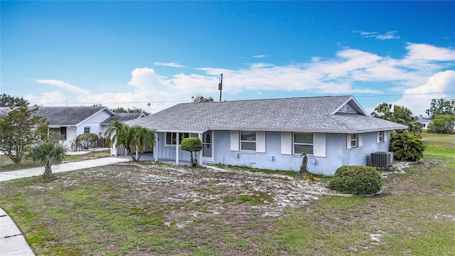 904 Desert Hills Dr, Sun City Center, FL 33573 - view of front of house with roof with shingles, concrete block siding, and concrete driveway