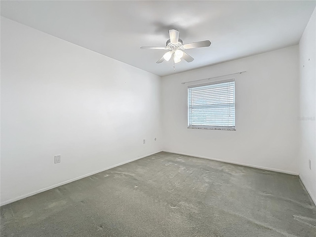 904 Desert Hills Dr, Sun City Center, FL 33573 - carpeted spare room with ceiling fan and baseboards