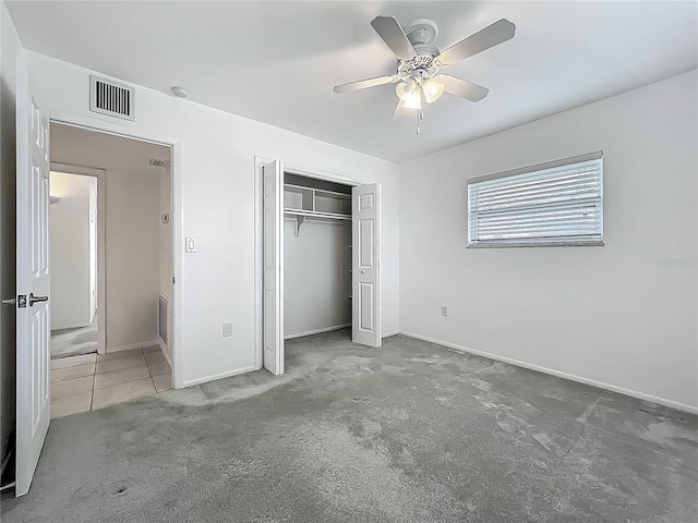 904 Desert Hills Dr, Sun City Center, FL 33573 - unfurnished bedroom featuring carpet, a closet, and a ceiling fan