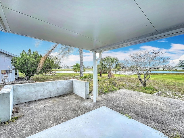 904 Desert Hills Dr, Sun City Center, FL 33573 - view of patio with a water view