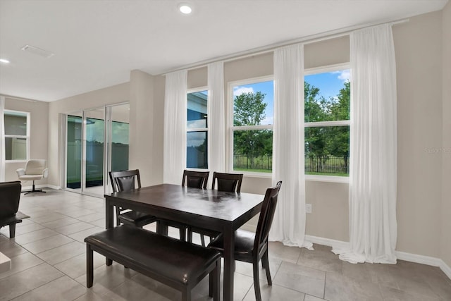10379 Bridgegate Heights Loop, San Antonio, FL 33576 - dining area featuring light tile patterned flooring, baseboards, and recessed lighting