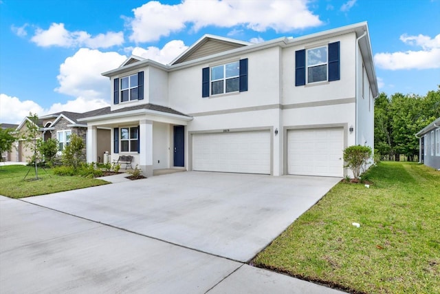10379 Bridgegate Heights Loop, San Antonio, FL 33576 - traditional home with an attached garage, stucco siding, concrete driveway, and a front yard
