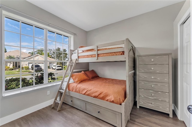 1530 The Oaks Blvd, Kissimmee, FL 34746 - bedroom featuring wood finished floors and baseboards