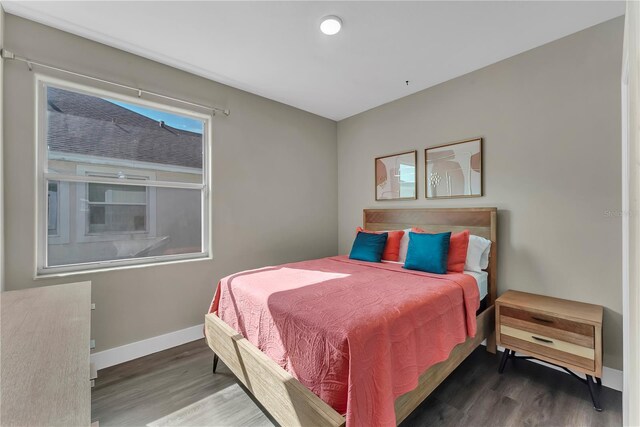 1530 The Oaks Blvd, Kissimmee, FL 34746 - bedroom with wood finished floors and baseboards