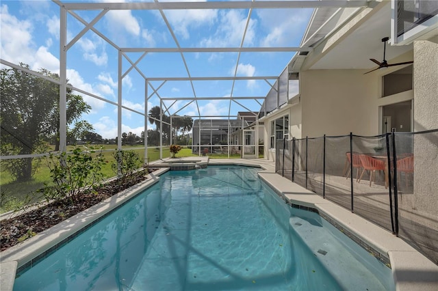 1530 The Oaks Blvd, Kissimmee, FL 34746 - view of pool with a pool with connected hot tub, ceiling fan, a patio area, and a lanai