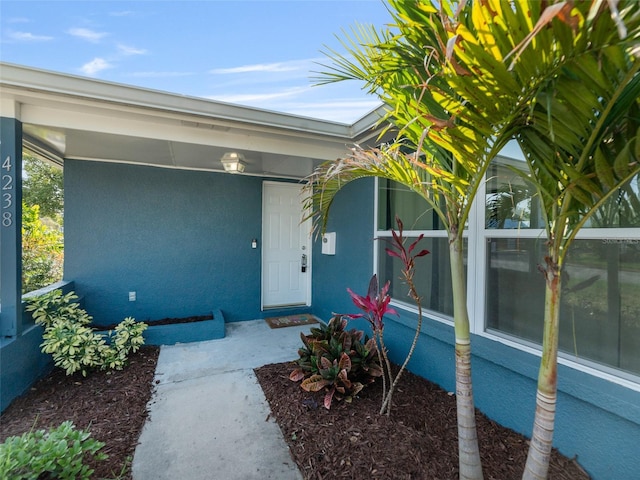 4238 Glissade Dr, New Port Richey, FL 34652 - view of exterior entry with stucco siding
