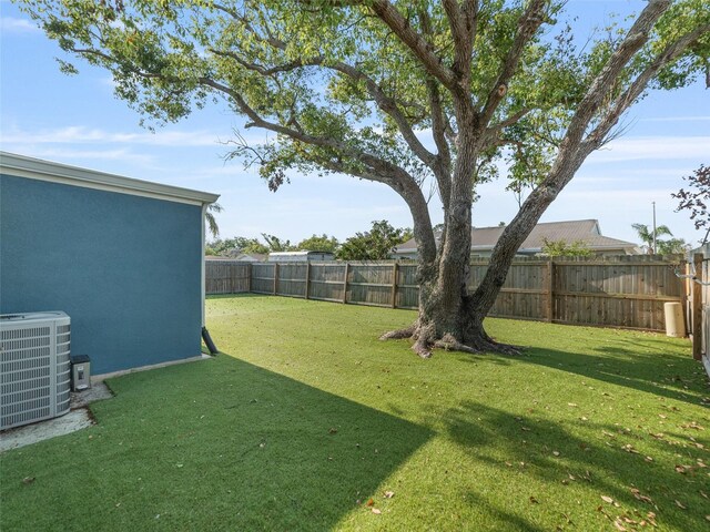 4238 Glissade Dr, New Port Richey, FL 34652 - view of yard featuring central AC