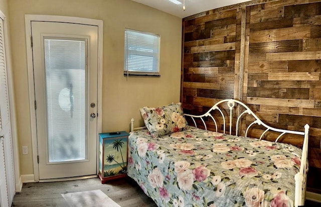 bedroom with wood finished floors