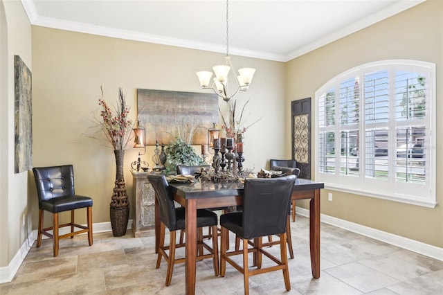 dining room featuring plenty of natural light, a chandelier, crown molding, and baseboards