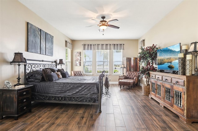 bedroom with wood finished floors and a ceiling fan