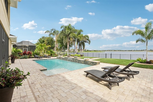 view of pool with a water view, a fenced backyard, a patio area, and glass enclosure