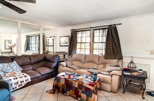 504 Casas Bonitas Dr, Nokomis, FL 34275 - living area featuring light tile patterned flooring and ornamental molding