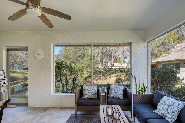 2870 Rampart Cir, Clearwater, FL 33761 - sunroom / solarium with an outdoor hangout area, healthy amount of natural light, and a ceiling fan