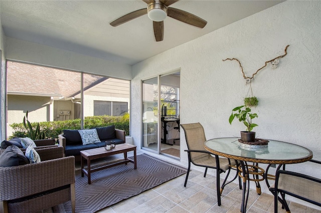 2870 Rampart Cir, Clearwater, FL 33761 - sunroom with a ceiling fan and an outdoor living space