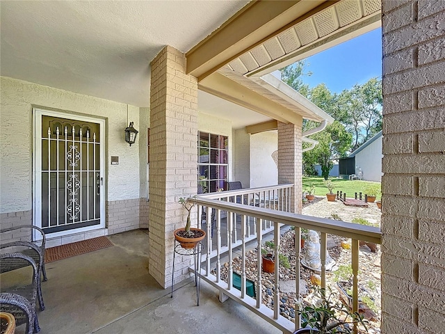 10520 Tapestry Dr, Port Richey, FL 34668 - property entrance with brick siding and covered porch