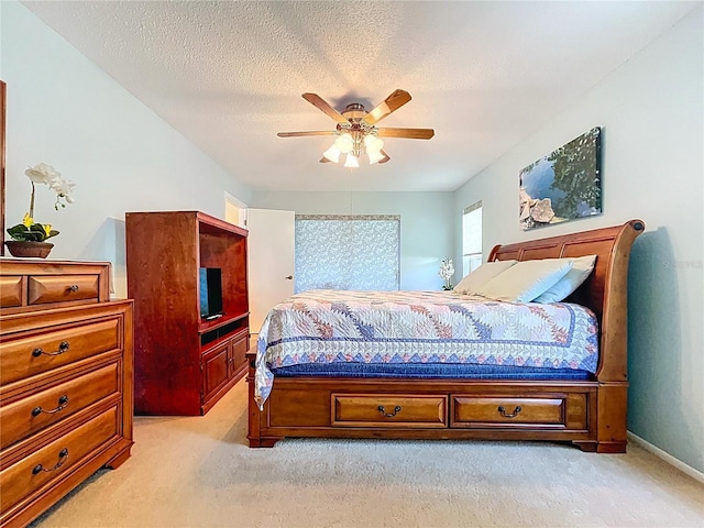 10520 Tapestry Dr, Port Richey, FL 34668 - bedroom featuring light colored carpet and a ceiling fan