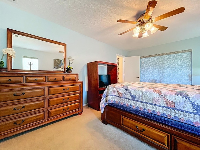 10520 Tapestry Dr, Port Richey, FL 34668 - bedroom with light carpet and ceiling fan
