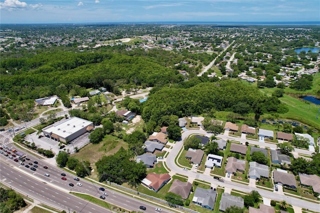 10520 Tapestry Dr, Port Richey, FL 34668 - aerial view of property's location featuring a large body of water and nearby suburban area