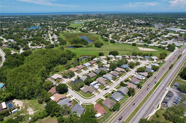 10520 Tapestry Dr, Port Richey, FL 34668 - aerial view of property's location featuring a nearby body of water and nearby suburban area