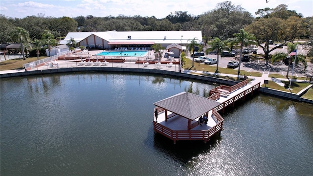 10520 Tapestry Dr, Port Richey, FL 34668 - dock area with a water view and view of wooded area