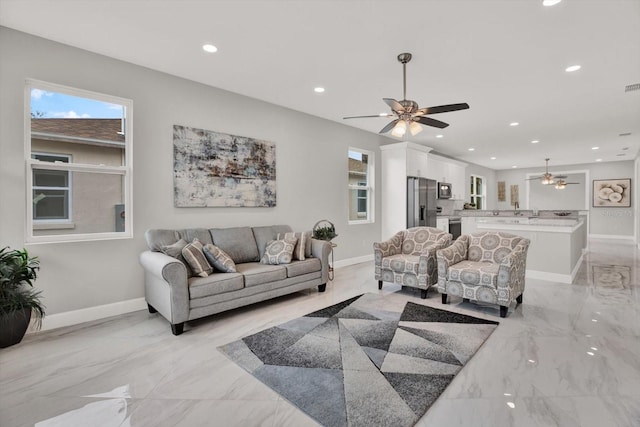 4071 45th Ave N, Saint Petersburg, FL 33714 - living room with ceiling fan, light marble finish floors, baseboards, and recessed lighting