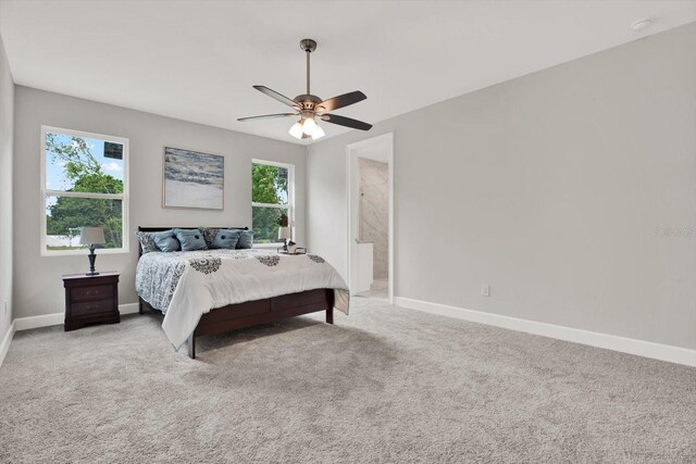 4071 45th Ave N, Saint Petersburg, FL 33714 - bedroom with carpet flooring, baseboards, and a ceiling fan