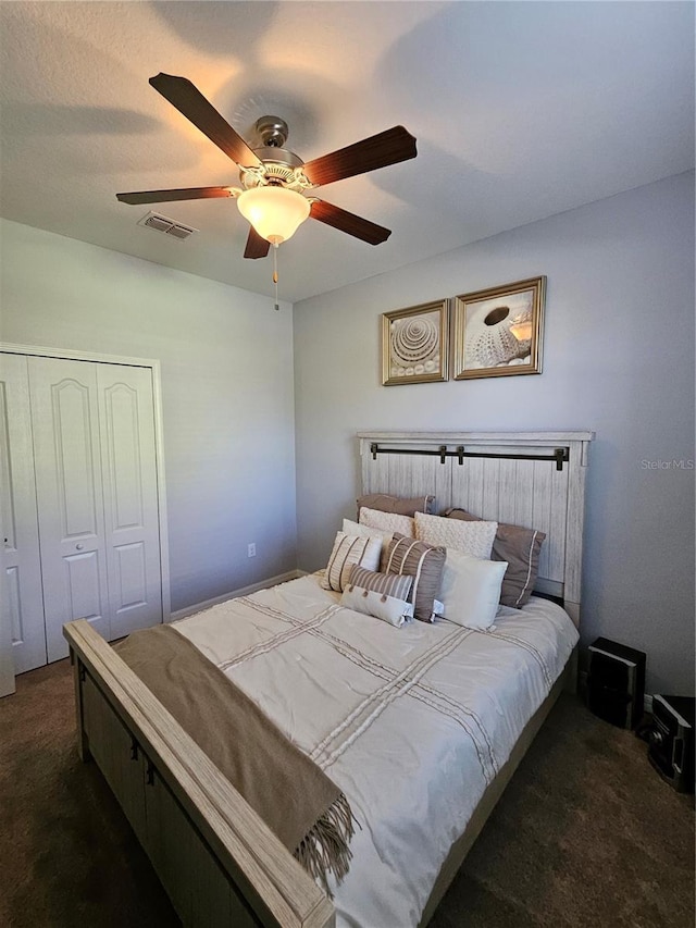 11617 Brighton Knoll Loop, Riverview, FL 33579 - bedroom featuring dark colored carpet, a ceiling fan, and a closet