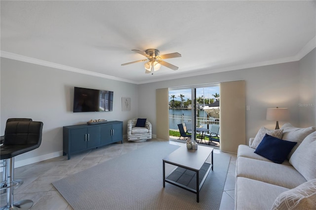 4103 Gulf Blvd Unit 107, St Pete Beach, FL 33706 - living area with ornamental molding, ceiling fan, and baseboards