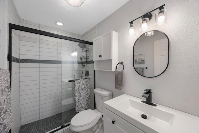 4103 Gulf Blvd Unit 107, St Pete Beach, FL 33706 - bathroom with toilet, vanity, and a stall shower