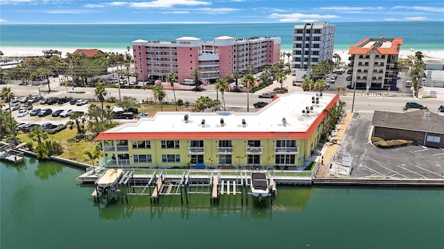4103 Gulf Blvd Unit 107, St Pete Beach, FL 33706 - drone / aerial view of a large body of water and apartment complex