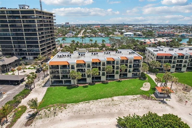 7564 Bayshore Dr Unit 302, Treasure Island, FL 33706 - drone / aerial view of a nearby body of water and apartment complex