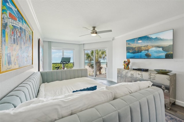 7564 Bayshore Dr Unit 302, Treasure Island, FL 33706 - living area with crown molding, baseboards, wood finished floors, ceiling fan, and a textured ceiling