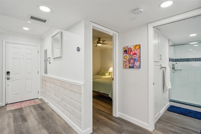 7564 Bayshore Dr Unit 302, Treasure Island, FL 33706 - entryway with wood finished floors, a ceiling fan, baseboards, and recessed lighting