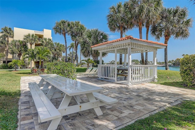 7564 Bayshore Dr Unit 302, Treasure Island, FL 33706 - view of patio with a gazebo and a water view