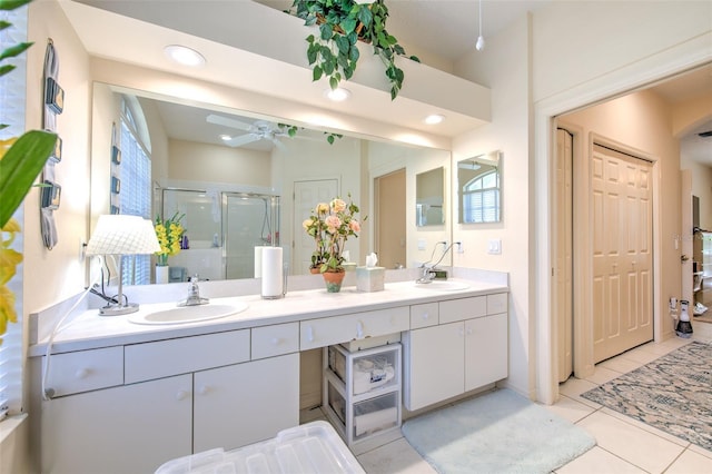 full bath featuring a shower stall, double vanity, ceiling fan, tile patterned flooring, and recessed lighting