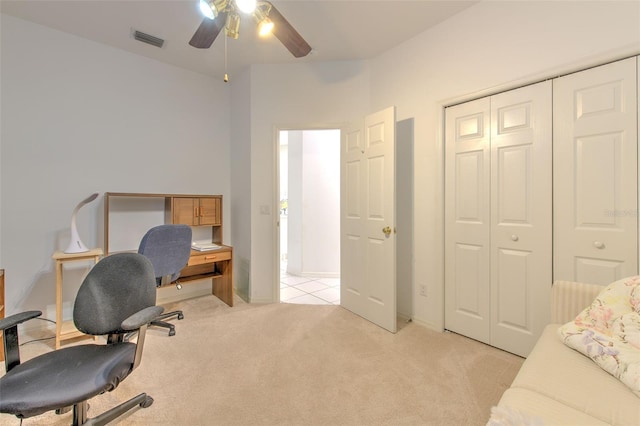 office with light carpet and ceiling fan