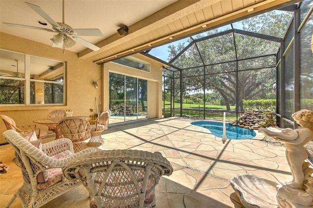 view of patio featuring a ceiling fan, an outdoor pool, and glass enclosure
