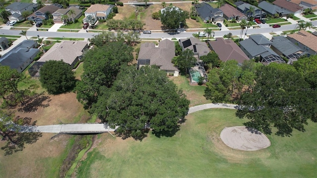 aerial view of property and surrounding area with nearby suburban area