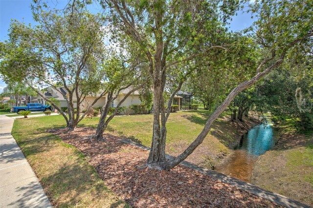 view of front of property with a front yard and stucco siding