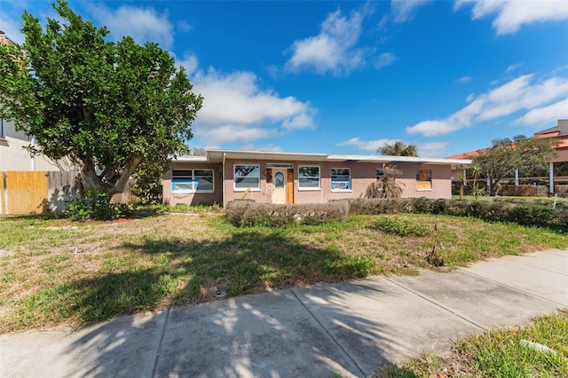 7075 Sunset Dr S, South Pasadena, FL 33707 - view of front of home with stucco siding