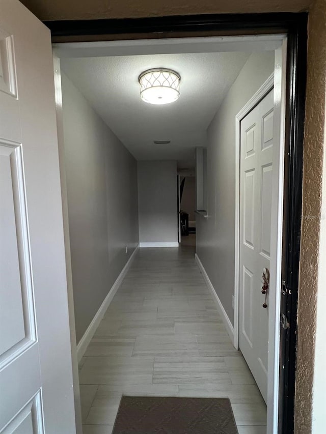 8423 Edgewater Place Blvd, Tampa, FL 33615 - hallway with baseboards