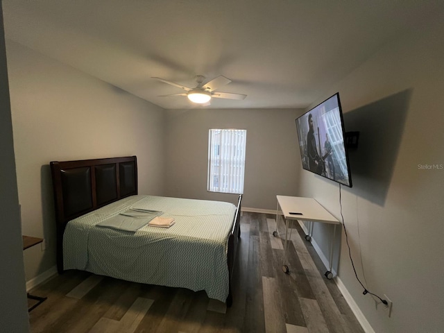 8423 Edgewater Place Blvd, Tampa, FL 33615 - bedroom featuring dark wood-type flooring, baseboards, and ceiling fan