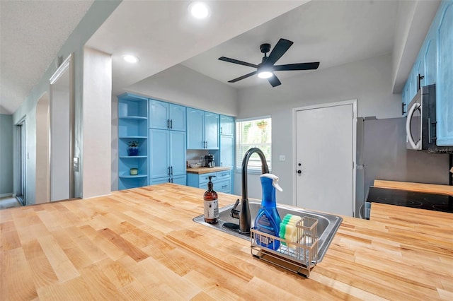 2003 Cordova Grn, Seminole, FL 33777 - exercise room featuring a ceiling fan, vaulted ceiling, and recessed lighting