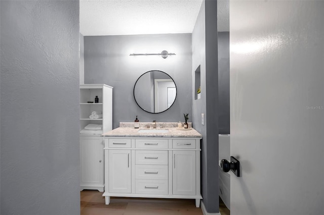 2003 Cordova Grn, Seminole, FL 33777 - bathroom featuring vanity and wood finished floors