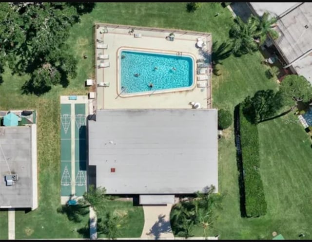 11511 113th St Unit 5C, Largo, FL 33778 - aerial view of property and surrounding area featuring a pool area