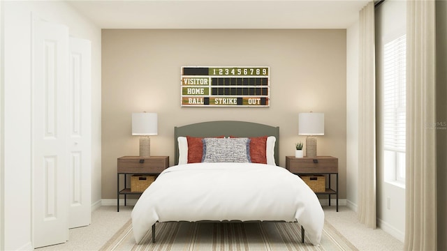 bedroom featuring light carpet and baseboards