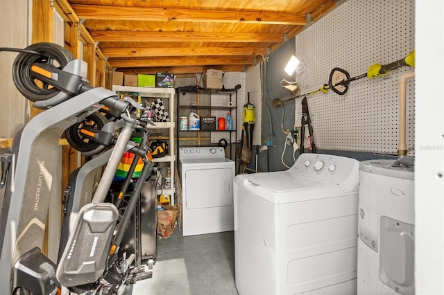 3245 Freemont Ter S, Saint Petersburg, FL 33712 - laundry area featuring electric water heater and independent washer and dryer